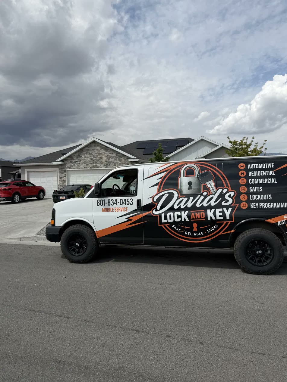 The wrapped van parked on a residential street on a job