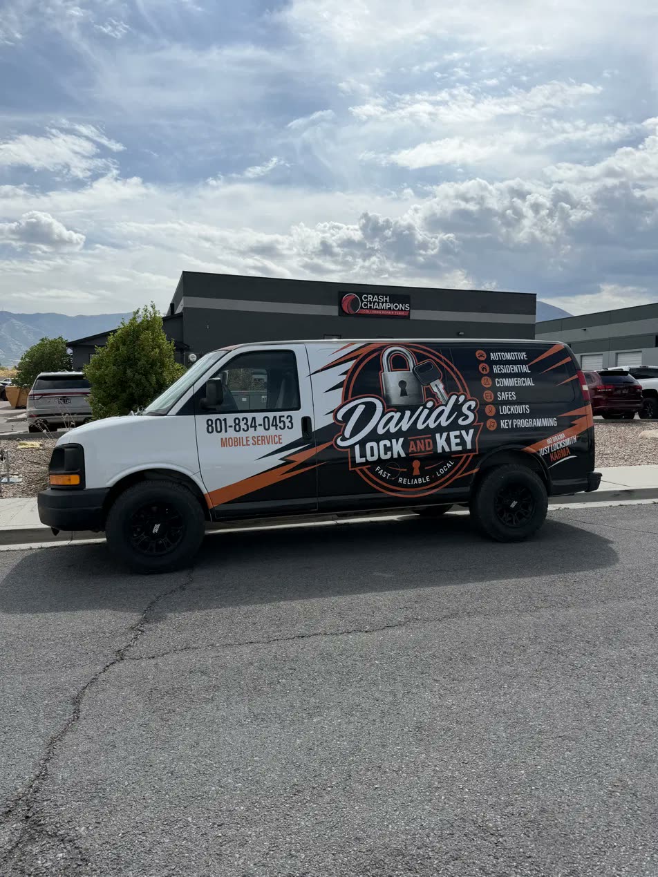 Full side profile of the David's Lock and Key wrapped service van